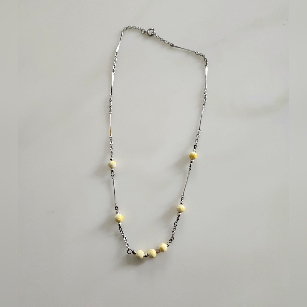 Elegant Silver and Yellow Beaded Necklace